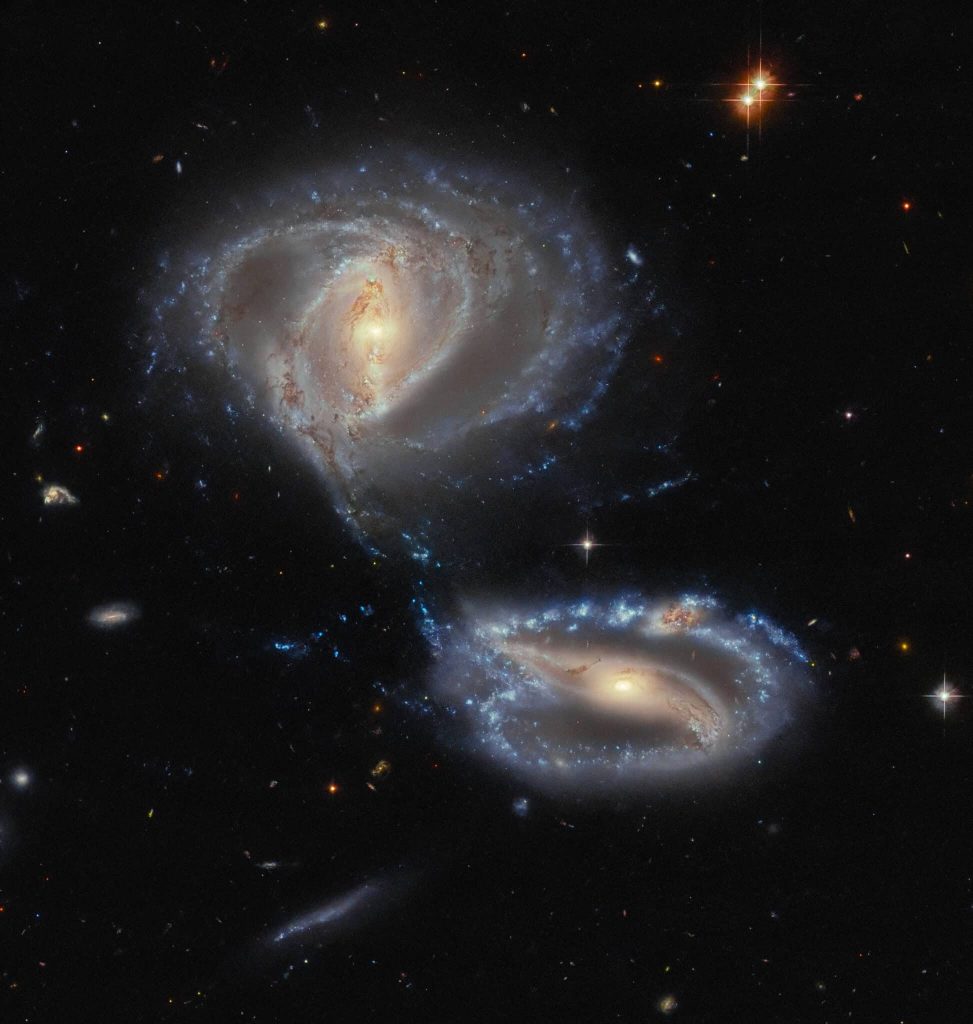 Hubble foto NGC 7733, NGC 7734 en NGC 7733N